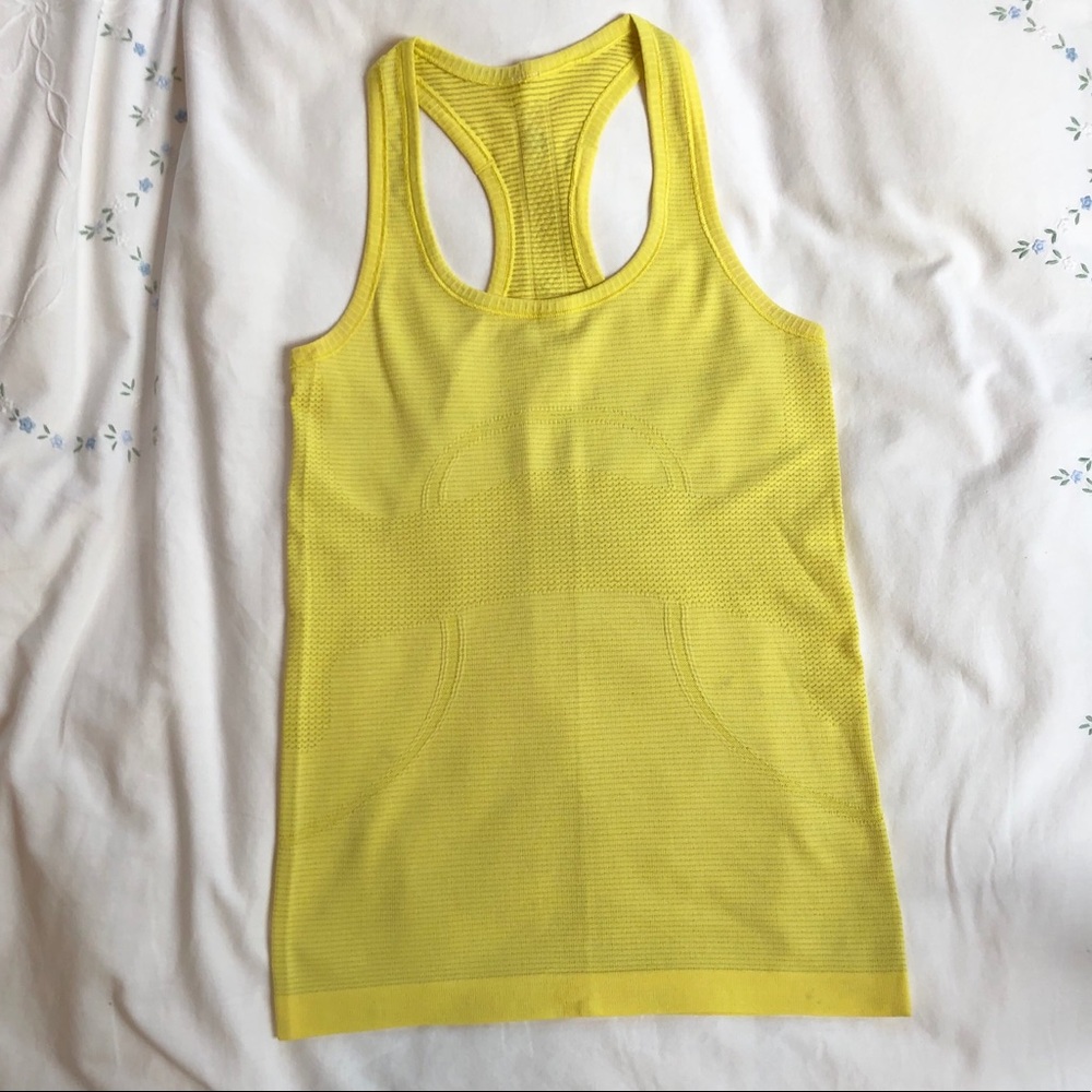 Lululemon yellow Run Swiftly tank in size 4